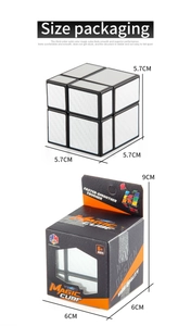 Detail view of 5.7cm silver mirror cube toy with branded retail packaging box