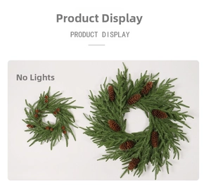 Detail view of two pine needle Christmas wreaths with pinecones in 30cm and 50cm sizes