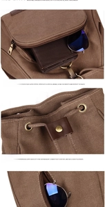 Detail view of coffee canvas backpack with front zipper pocket and metal drawstring eyelets