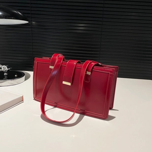 Retro red faux leather shoulder bag with gold metal buckle and glossy oil finish