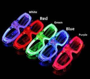 Detail view of colorful LED glowing glasses in white, red, green, blue and purple