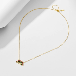 Golden S925 sterling silver necklace with rainbow semi-circle zircon pendant on white background