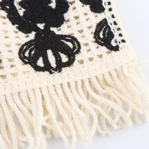 Retro crochet knitted vest with ethnic hollow patterns and long fringe tassels