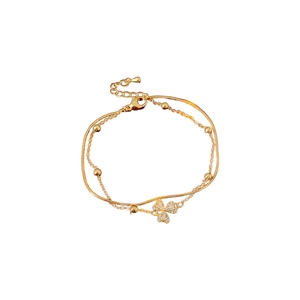 Zweilagiges goldenes Kleeblatt Armband mit Zirkonia und eleganter Schlangenkette