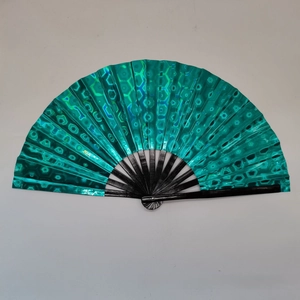 Detail of 10 inch rainbow fan featuring green holographic laser honeycomb texture and black ribs
