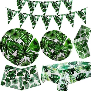 Detailed set of tropical leaf party plates, napkins, and tablecloth for summer celebrations