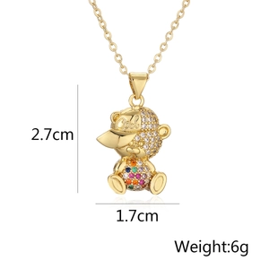 Detail showing 2.7cm gold teddy bear pendant with Cool cap and inlaid crystals