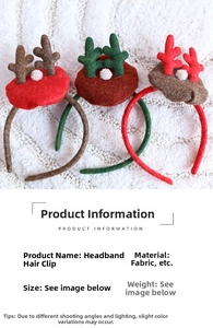Detailed view of plush reindeer antlers Christmas headband with festive white pom-poms
