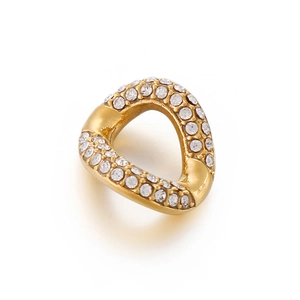Detailed view of an irregular gold ring featuring embedded clear sparkling gemstones