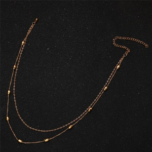 Zweilagige goldene Edelstahl-Halskette mit ovalen Perlen und verstellbarem Verschluss