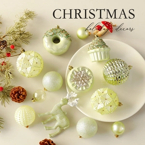 Pastel green Christmas ball ornaments set with reindeer and cupcake shaped pendants