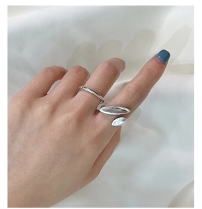 Minimalist S925 sterling silver rings with irregular shapes worn on female fingers