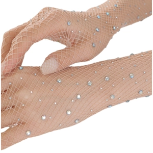Detailed view of nude fishnet gloves with sparkling rhinestones on high-stretch mesh fabric