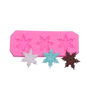 Pink silicone snowflake mold for Christmas fondant, chocolate, and DIY cake decoration