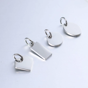 Polished stainless steel necklace tags in shield, rectangle, round, and oval shapes