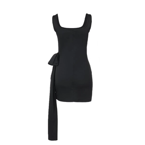 Detail shot of black slim-fit dress featuring a side bow and elegant draped ribbons