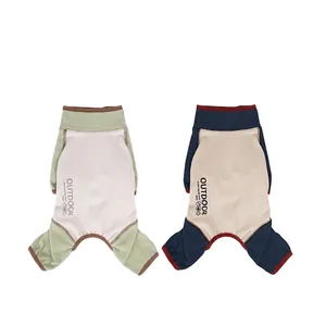 Cozy two-tone four-legged dog sweater in green and navy blue with outdoor print