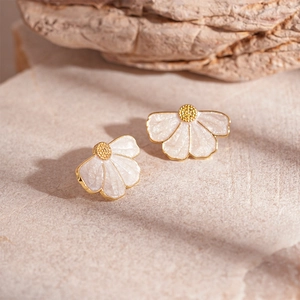 Elegant gold-trimmed fan-shaped stud earrings with pearlescent white enamel petals