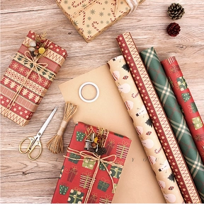 Flat lay of vintage Christmas kraft wrapping paper with reindeer and snowman patterns