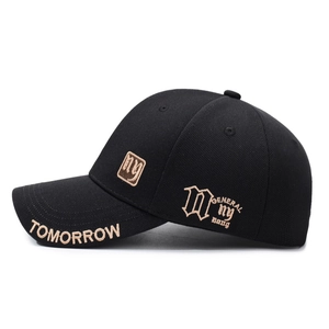 Classic black embroidered baseball cap with textured fabric and brown letter embroidery