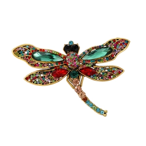 Vintage gold dragonfly brooch with colorful crystal rhinestones and emerald green wings