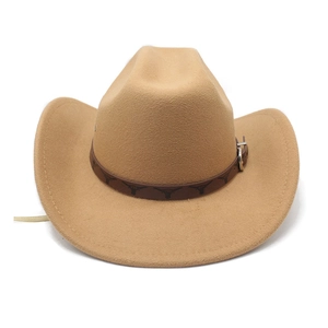 Detail view of camel cowboy hat featuring bull-head pattern band and metal buckle