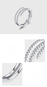 Close-up of S925 sterling silver triple spiral ring with handcrafted prong-set zircon