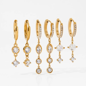 Three pairs of elegant gold stainless steel earrings with sparkling zircon dangles