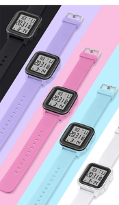 Digital sports watches in five colors showing clear rectangular LED displays and silicone bands