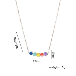 Detail view of mini rainbow smiley necklace showing 28mm pendant width and 40cm chain length