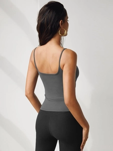 Detail of dark grey slim-fit tank top back showing elastic fabric and thin straps