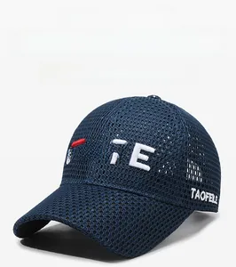 Detail of navy mesh baseball cap with FBQE embroidery and breathable fabric texture