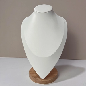 Detail of white bust necklace display stand with circular solid beech wood base