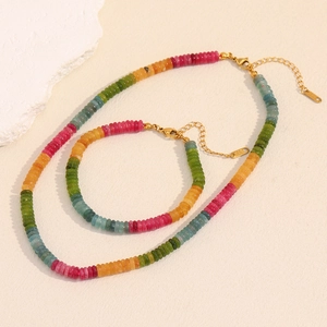 Detail of 18K gold-plated jewelry set featuring colorful tourmaline-style gemstone beads