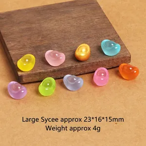 Detailed size view of colorful resin gold ingot figurines with dimensions 23x16x15mm