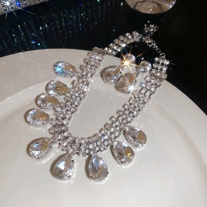 Elegant multi-layer rhinestone necklace with teardrop pendant fringe in silver finish