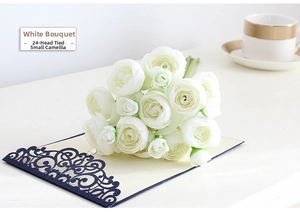 Detail of 24 heads white camellia silk flowers bundle for wedding decoration