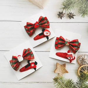 Christmas hair clip set with red plaid bows and cute Santa Claus decorations for kids