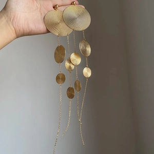 Statement geometric gold round textured fringe tassel drop earrings with tiered design