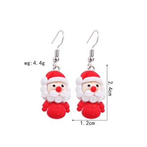 Detail showing Santa Claus resin earrings dimensions 2.4cm by 1.2cm and weight 4.4g