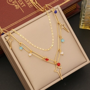 Double-layered gold stainless steel necklace with crystal star and colorful beads on box