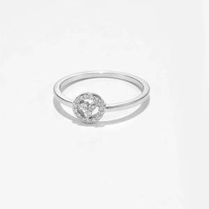 Minimalist S925 sterling silver ring featuring a round pave-set cubic zirconia centerpiece