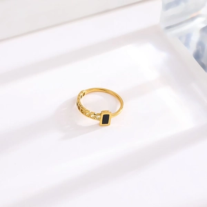 Minimalist gold titanium steel ring with asymmetric chain and black rectangular inlay