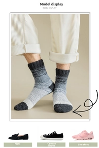 Detail of men's thick coral fleece winter sleep socks with black and grey gradient stripes