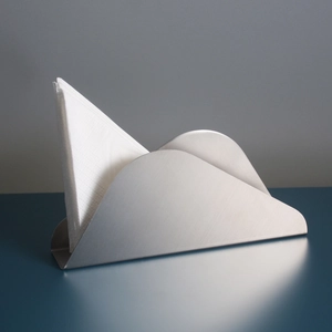 Modern stainless steel napkin holder with a mountain shape design for dining tables
