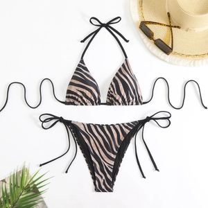 Women's zebra print halter bikini set with side tie bottoms for beach vacation