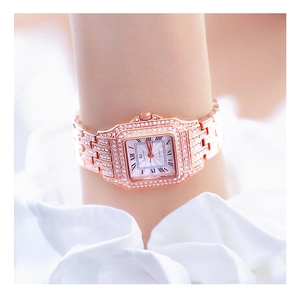 Luxury rose gold square watch for women featuring a full diamond bezel and Roman numerals