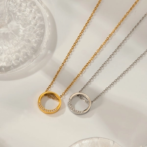 Minimalist stainless steel circular pendant necklaces in gold and silver with zircon accents