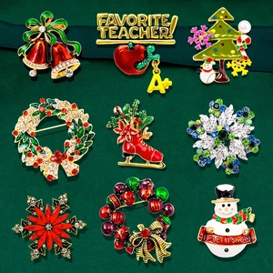 9-piece set of festive Christmas enamel brooches with tree and snowflake designs