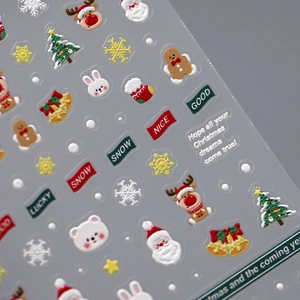 5D Christmas embossed nail stickers featuring Santa, reindeer, and snowflakes design